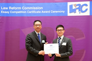 Mr Rimsky Yuen, SC, LRC Chairman, awarded a certificate to Mr David Wen