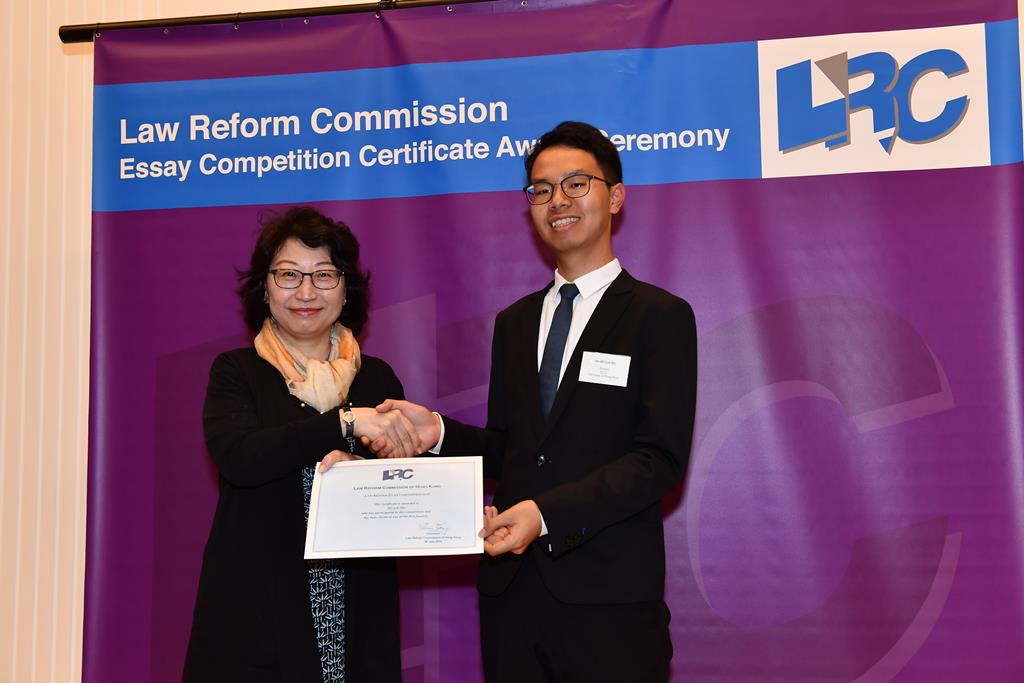 Ms Teresa Cheng, SC, LRC Chairman, awarded a certificate to Mr Ho Lok Hei