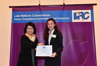 Ms Teresa Cheng, SC, LRC Chairman, awarded a certificate to Miss Sung Sze Ying Priscilla