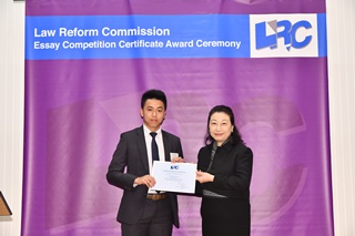 Ms Teresa Cheng, SC, LRC Chairman, awarded a certificate to Mr Chan Pak Hay 