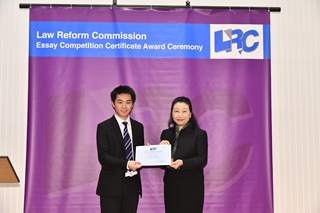 Ms Teresa Cheng, SC, LRC Chairman, awarded a certificate to Mr Cheng Hoi Fai Herbert 