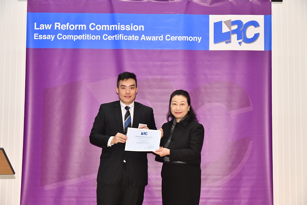 Ms Teresa Cheng, SC, LRC Chairman, awarded a certificate to Mr Fu Kwong Or